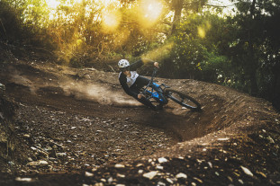 Mondraker Sly through a berm Mondraker Sly through a berm
