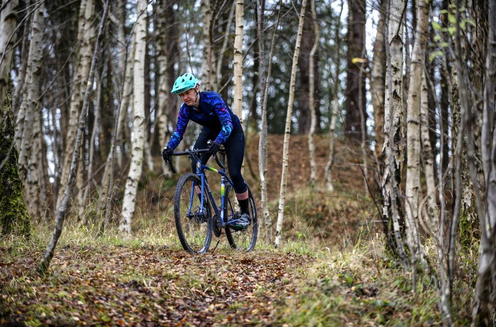 Gravel riding woman.jpeg Beginners guide on how to plan new gravel routes