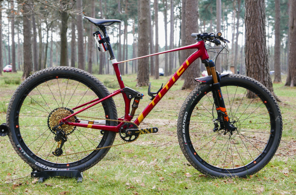 Titici-Flexy-MTB-FS-custom-carbon-FS-100.jpg Titici's Flexy MTB FS is a totally custom carbon race superbike