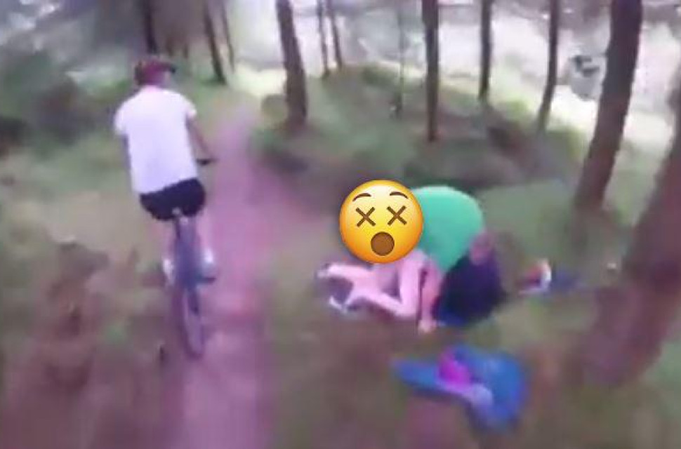 cyclist-and-couple-coupling-facebook-video-still.jpg Video: Couple caught erm, coupling, by riders